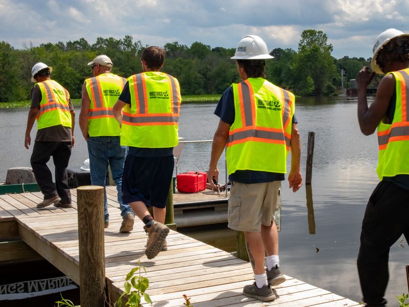 Hastings Marine Construction crew heading out on a pier job
