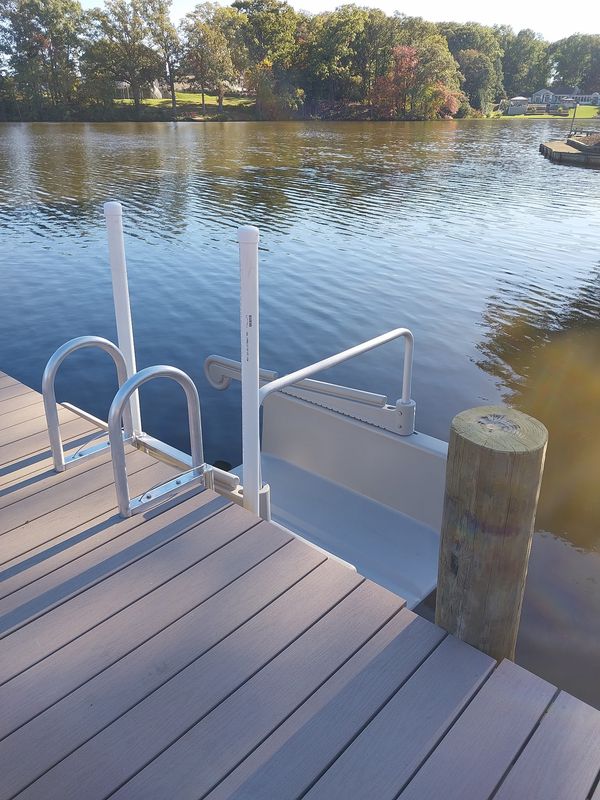 Aluminum ladder and handrails at the edge of a dock