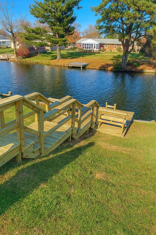 Access steps down a waterfront slope