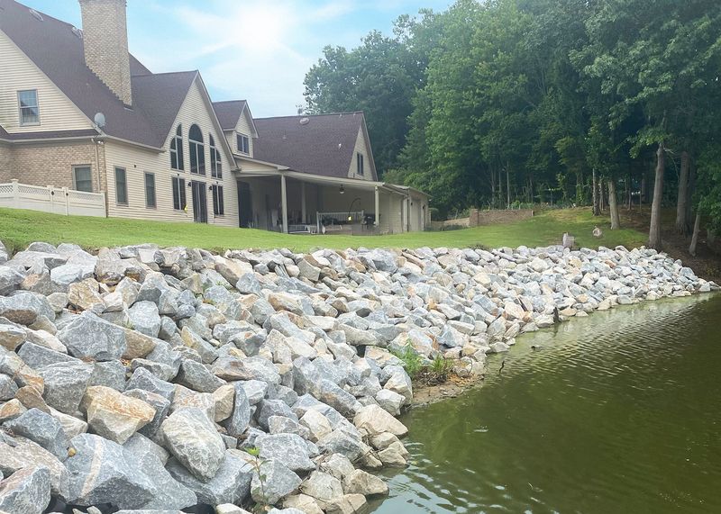 Rip-rap revetment protecting a waterfront home